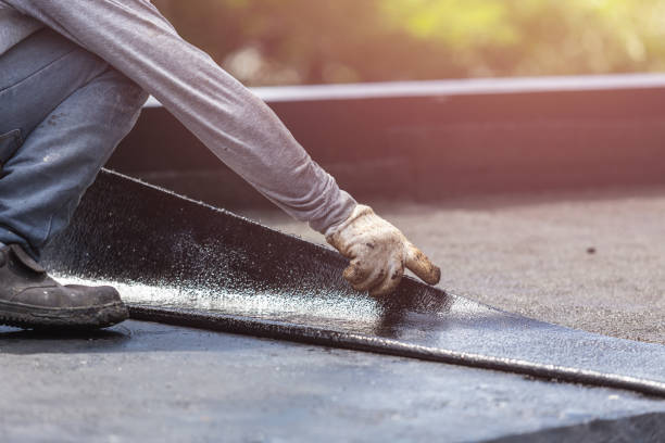 Professional Basement Waterproofing technician working in Walhalla, MI